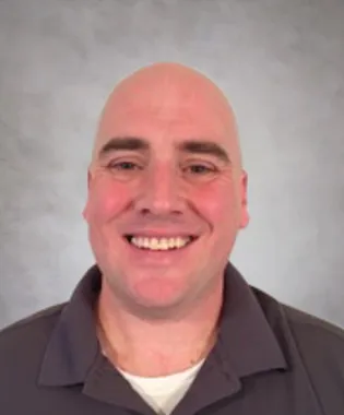 A portrait of Christopher Rourke, PA.