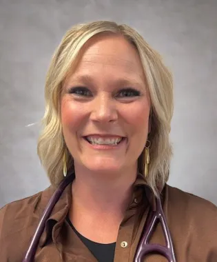 A portrait of Casey LaRue, FNP.