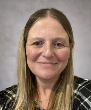 A portrait of Christie Mase, APRN, FNP-C.