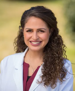 A portrait of Tara Jean Casey, FNP.