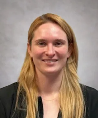 A portrait of Holly Cade, PA.