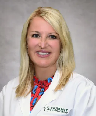 A portrait of Mindy Wenger, FNP-C.