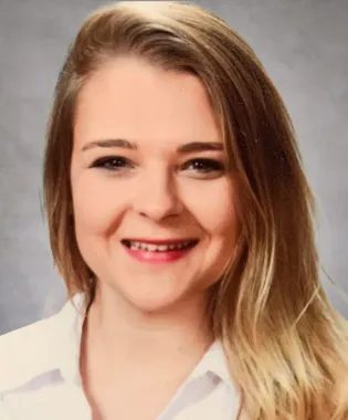 A portrait of Michaela Paschal, FNP-C.