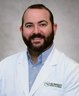 A portrait of Matthew D. Blair, MD.