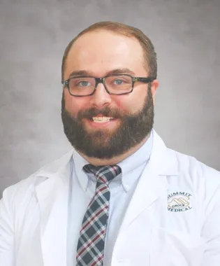 A portrait of R. Theo Hensley, MD.