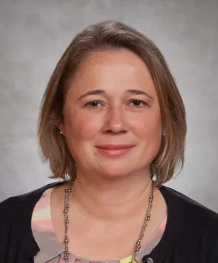 A portrait of Sonja B. Woods, MD.