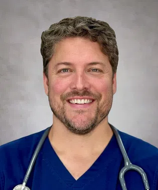 A portrait of Randall Van Dolson, MPH, FNP-BC.