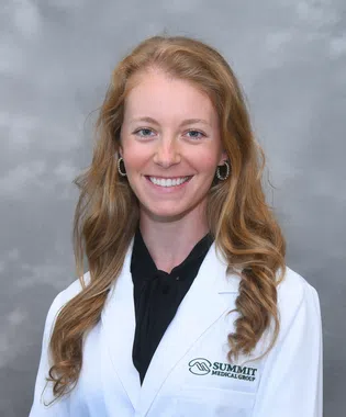A portrait of Lauren E. Wade, MD.