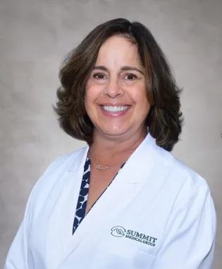A portrait of Sheri Zieminick, MD.