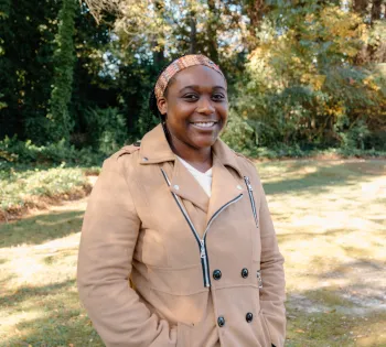 a person smiling outside