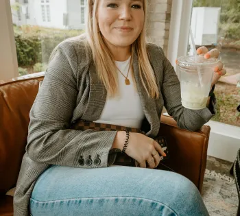 a woman sitting on a chair