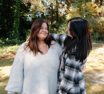 two women standing together