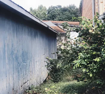 a house on the side of a building