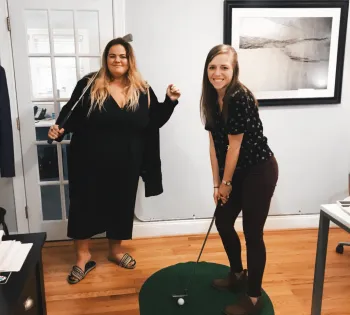 a man and a woman standing in a room