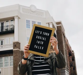 a man holding a sign