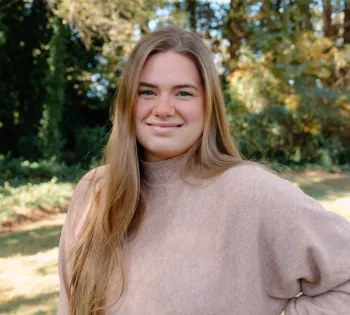 a woman with long blonde hair