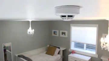 a room with a bed and a window