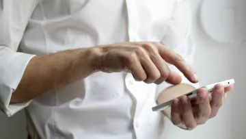 a man holding a phone