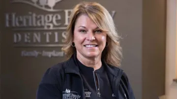 a person smiling for the camera