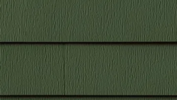 Close-up of dark green textured vinyl siding panels with horizontal overlapping design.