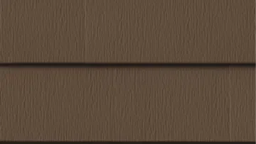 Close-up of dark brown wooden siding with horizontal panels and visible wood grain texture