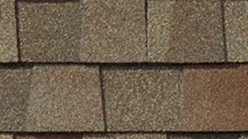 Cozy suburban house with brown shingle roof and front porch lights at dusk alongside close-up of brown asphalt shingles.