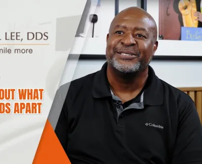 Smiling man Corey shares a patient testimonial about Paul Lee DDS dental care excellence.