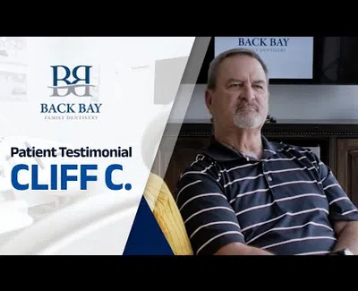 Patient testimonial featuring Cliff C. for Back Bay Family Dentistry with logo and man in striped shirt.