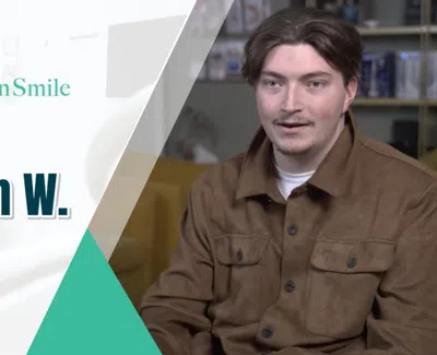 Patient Jackson W. shares testimonial for Levenson Smile dental clinic in a professional interview setting.