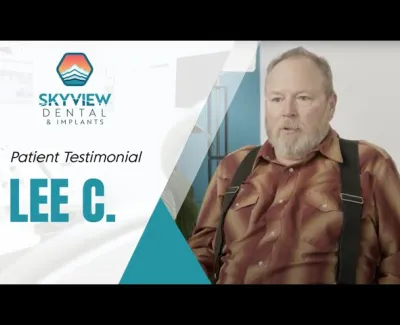 Patient testimonial video thumbnail featuring man Lee C. and Skyview Dental & Implants logo