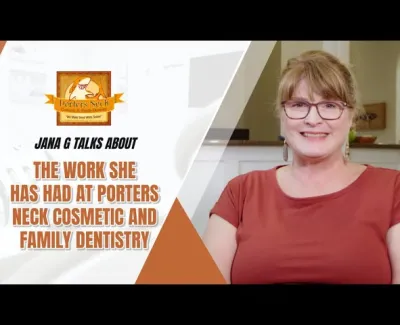 Smiling woman discussing her experience at Porters Neck Cosmetic and Family Dentistry in a video frame.