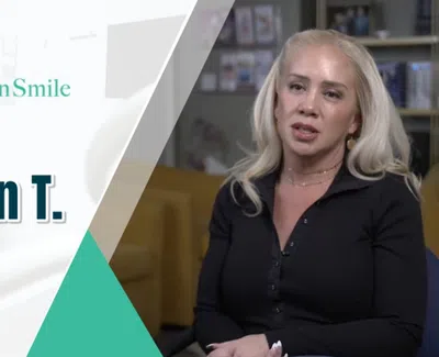 Patient Evelyn T. shares her testimonial at Levenson Smile dental clinic featuring a modern office background.