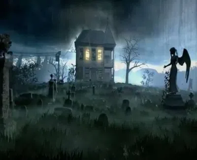 Foggy graveyard at night with tombstones, a statue, iron gate, and a lit haunted house in the background