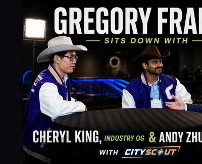 Gregory Frank interviews Cheryl King, Andy Zhu, and Saat Mohan seated around a table with studio lights.