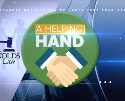 Carl Reynolds Law logo with A Helping Hand handshake graphic and city names over a modern blue background