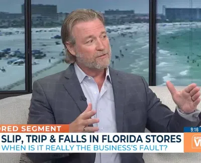 Man in suit discussing slip, trip, and fall liability on Florida stores with overlaid text reading about business fault and sponsorship