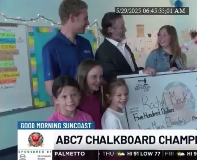 Teacher Rachel Mauk receives a $500 check as ABC7 Chalkboard Champions celebrate with smiling elementary students.