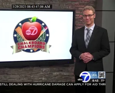 Two news anchors presenting ABC 7 Chalkboard Champions segment in front of screen with logo