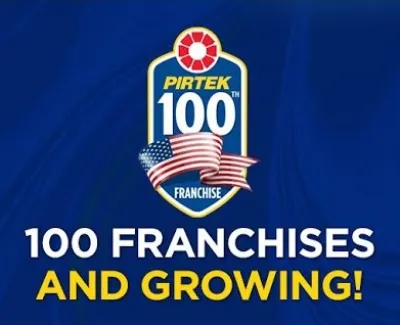 Pirtek celebrating 100 franchises with a bold logo, American flag, and message 100 franchises and growing on blue background