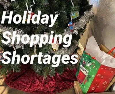 Christmas tree with Holiday Shopping Shortages text and a holiday gift bag nearby