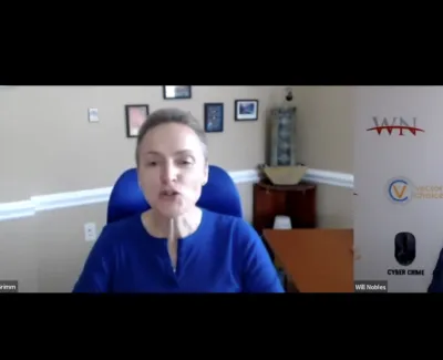 Two professionals in a virtual meeting discussing cyber crime and vector choice, with branded backgrounds visible.
