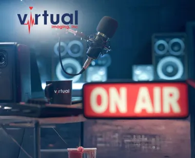 Podcast studio with microphone, 'ON AIR' sign, speakers, and Virtual Imaging logo and coffee mug.