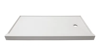 White rectangular shower base with raised edges and a circular drain hole on one side.