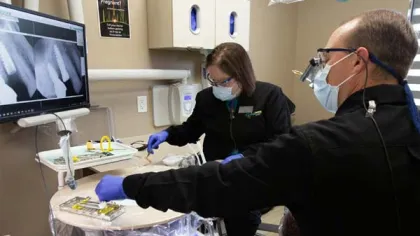 a man and a woman in a lab