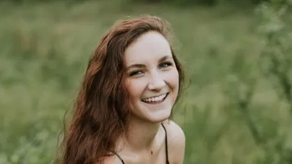a woman smiling for the camera