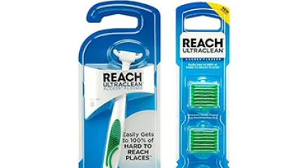 Reach Ultraclean Accu-Guard floss picks in green and white, packaged in blue and white blister packs.