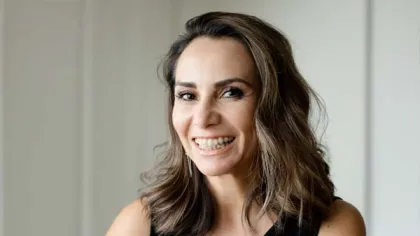 a woman smiling for the camera