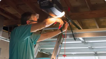 a man fixing a ceiling