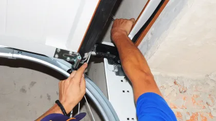 a person holding a tool