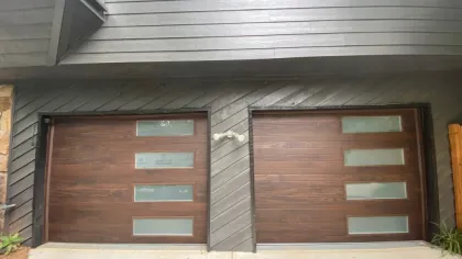 a garage door with a sign on it
